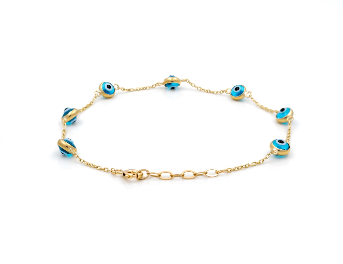 10K Yellow Gold Light Blue Eyes Women's Bracelet / Size: 7.5" / Weight: 1.6 GR
