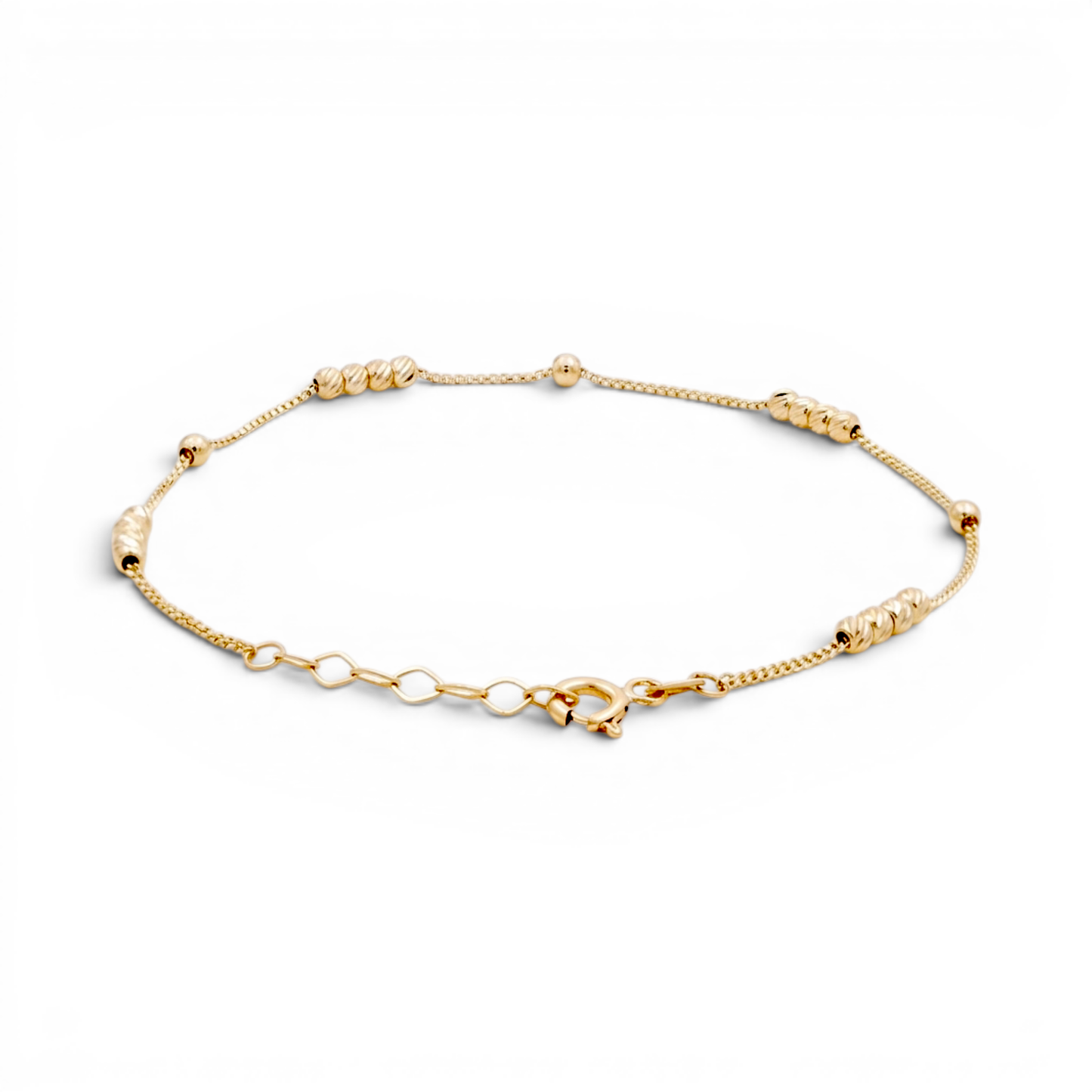10K Yellow Gold Fashion Link Bracelet with Diamond Cut Balls / Size: 7” / Weight: 1.2 GR