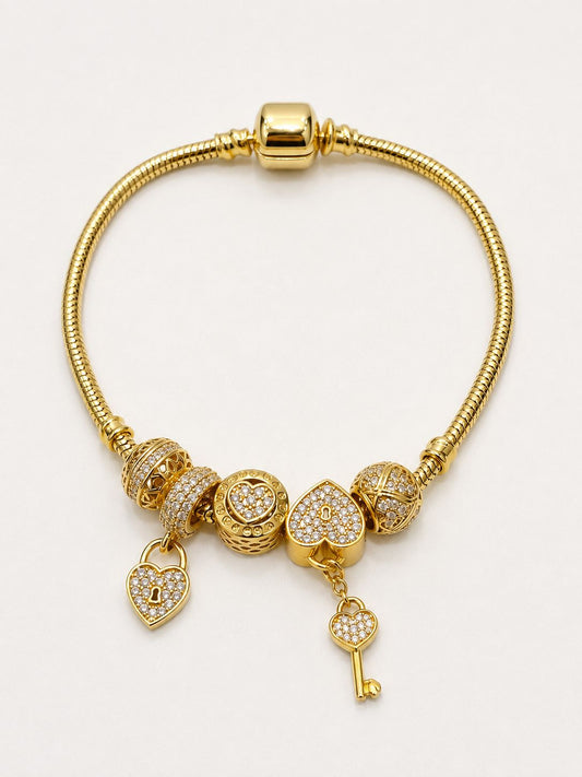 14K Yellow Gold Woman Bracelet With Charms / Size: 7.5" / Weight: / Custom Job