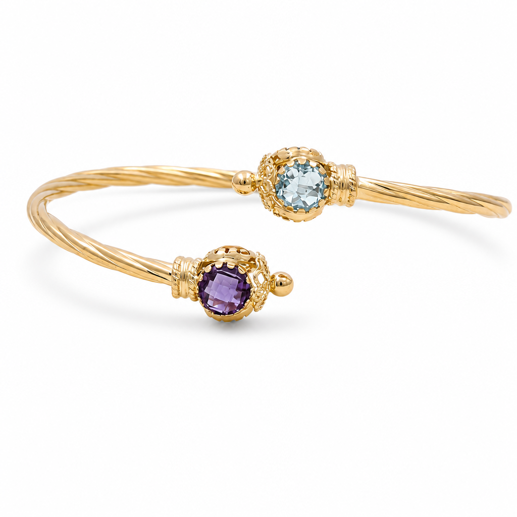 Brazalete semisólido torcido de oro amarillo 14K con zirconia azul y morada / Peso: 6.7 GR / BKC851